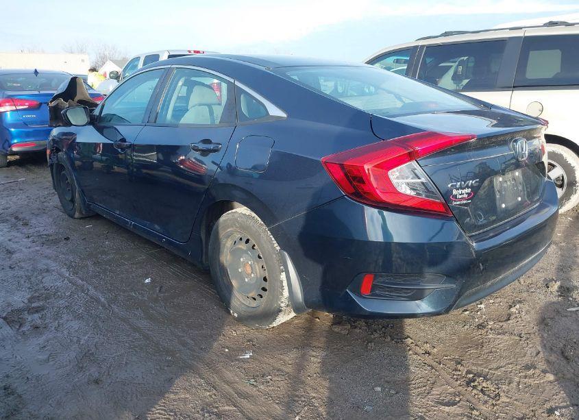 Photo 3 of 2018 Honda Civic LX (VIN 19XFC2F51JE024736)