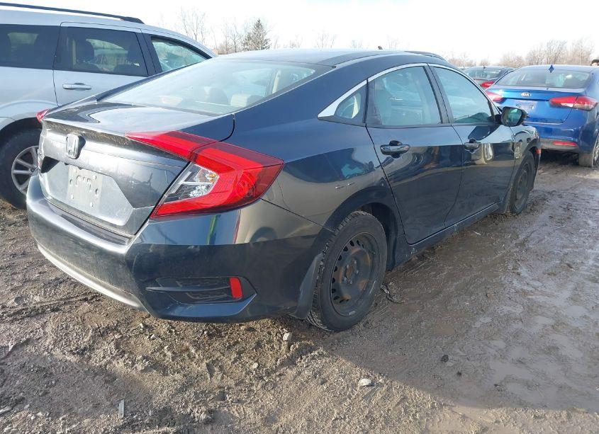 Photo 4 of 2018 Honda Civic LX (VIN 19XFC2F51JE024736)