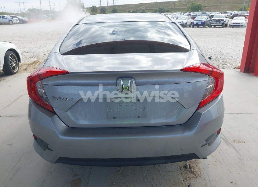 Photo 16 of 2018 Honda Civic LX (VIN 19XFC2F51JE030939)