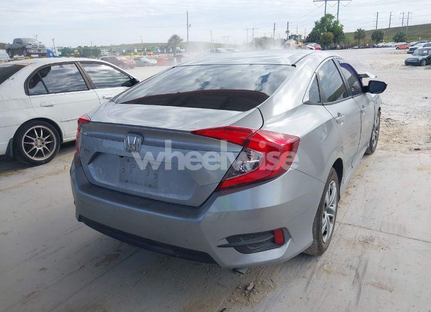 Photo 4 of 2018 Honda Civic LX (VIN 19XFC2F51JE030939)