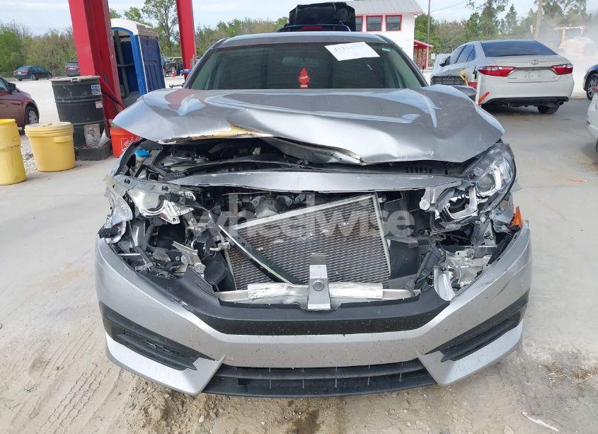 Photo 6 of 2018 Honda Civic LX (VIN 19XFC2F51JE030939)