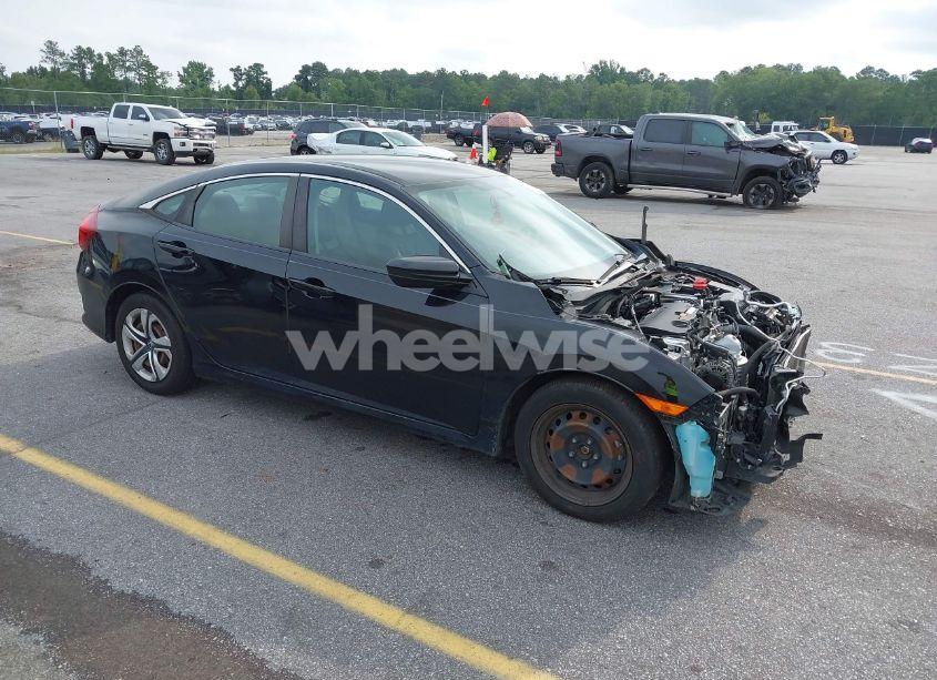 2018 Honda Civic LX (VIN 19XFC2F51JE040256) main photo