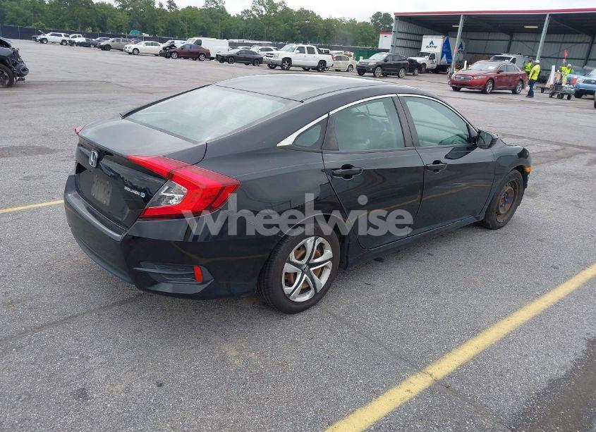 Photo 4 of 2018 Honda Civic LX (VIN 19XFC2F51JE040256)