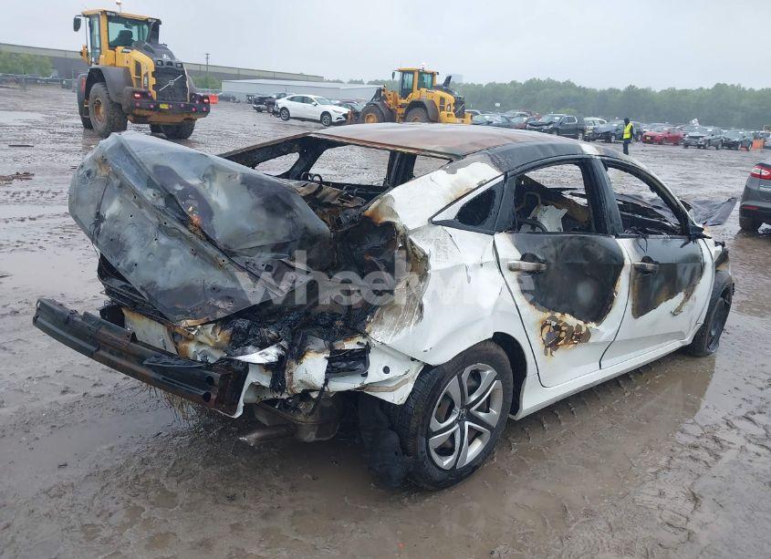 Photo 4 of 2018 Honda Civic LX (VIN 19XFC2F51JE043349)