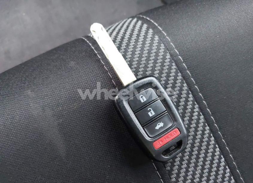 Photo 11 of 2018 Honda Civic LX (VIN 19XFC2F51JE200782)