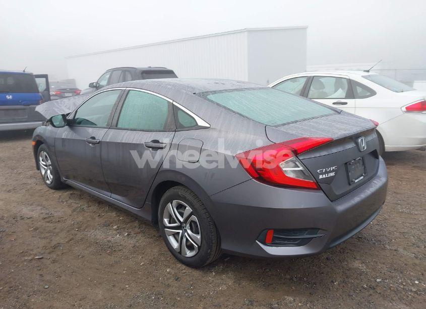 Photo 3 of 2018 Honda Civic LX (VIN 19XFC2F51JE200782)