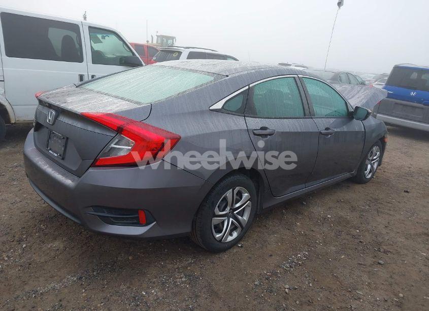 Photo 4 of 2018 Honda Civic LX (VIN 19XFC2F51JE200782)