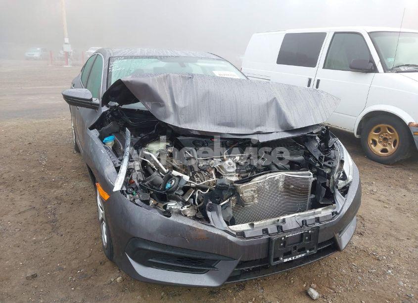 Photo 6 of 2018 Honda Civic LX (VIN 19XFC2F51JE200782)