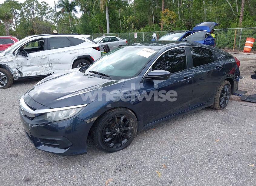 Photo 2 of 2016 Honda Civic LX (VIN 19XFC2F52GE069998)
