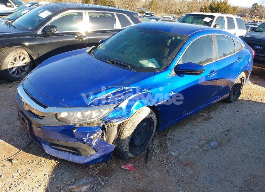 Photo 2 of 2017 Honda Civic LX (VIN 19XFC2F52HE010001)