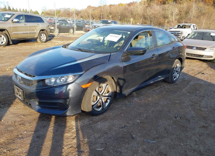 Photo 2 of 2017 Honda Civic LX (VIN 19XFC2F52HE048845)