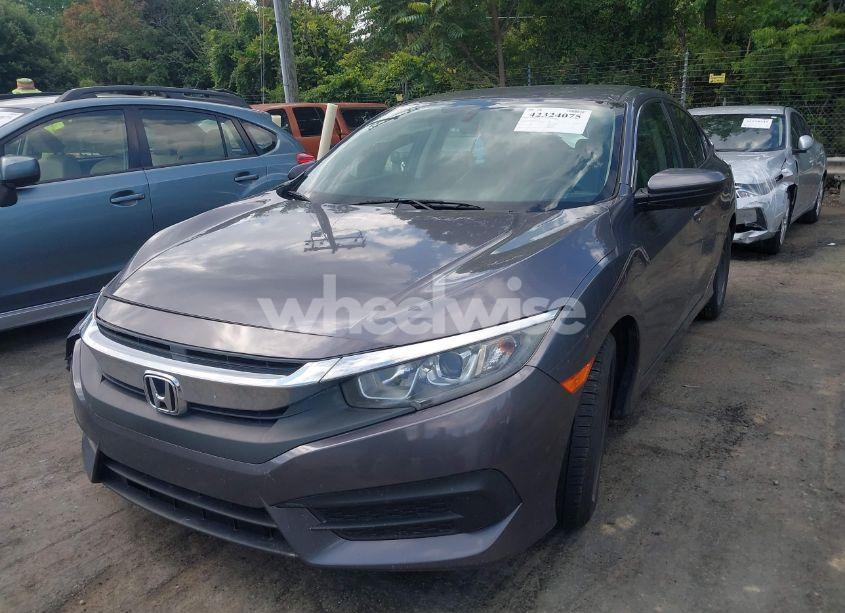 Photo 2 of 2017 Honda Civic LX (VIN 19XFC2F52HE053026)