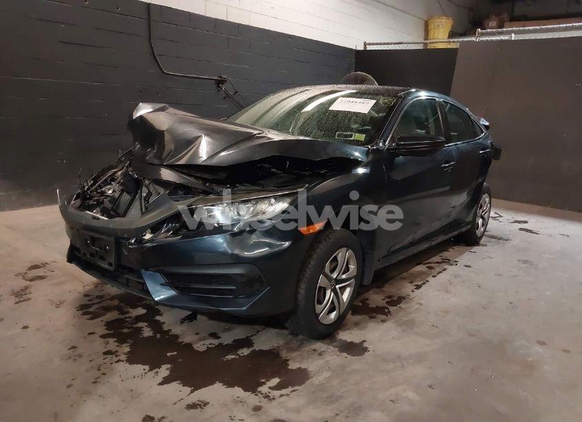 Photo 2 of 2017 Honda Civic LX (VIN 19XFC2F52HE202101)