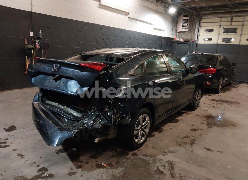 Photo 4 of 2017 Honda Civic LX (VIN 19XFC2F52HE202101)