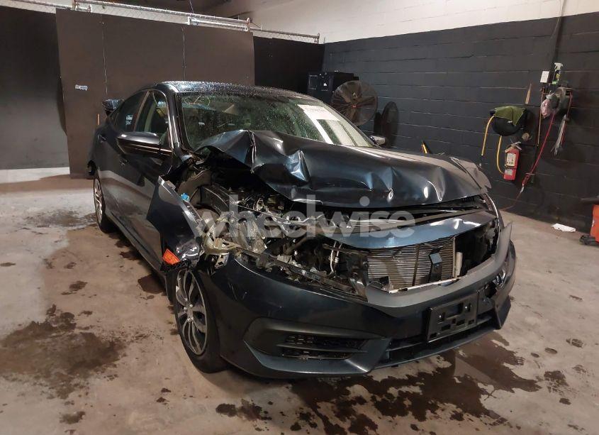 Photo 6 of 2017 Honda Civic LX (VIN 19XFC2F52HE202101)