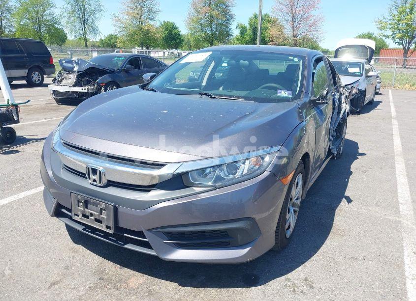 Photo 2 of 2017 Honda Civic LX (VIN 19XFC2F52HE203362)