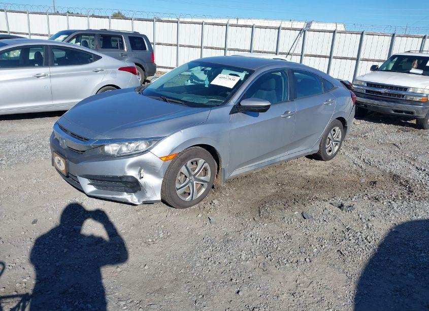 Photo 2 of 2017 Honda Civic LX (VIN 19XFC2F52HE206844)