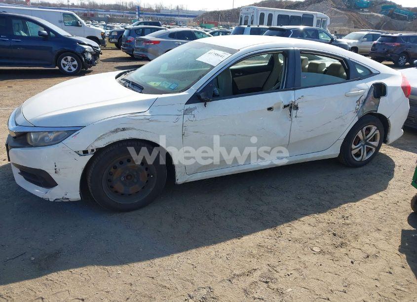 Photo 2 of 2017 Honda Civic LX (VIN 19XFC2F52HE223806)