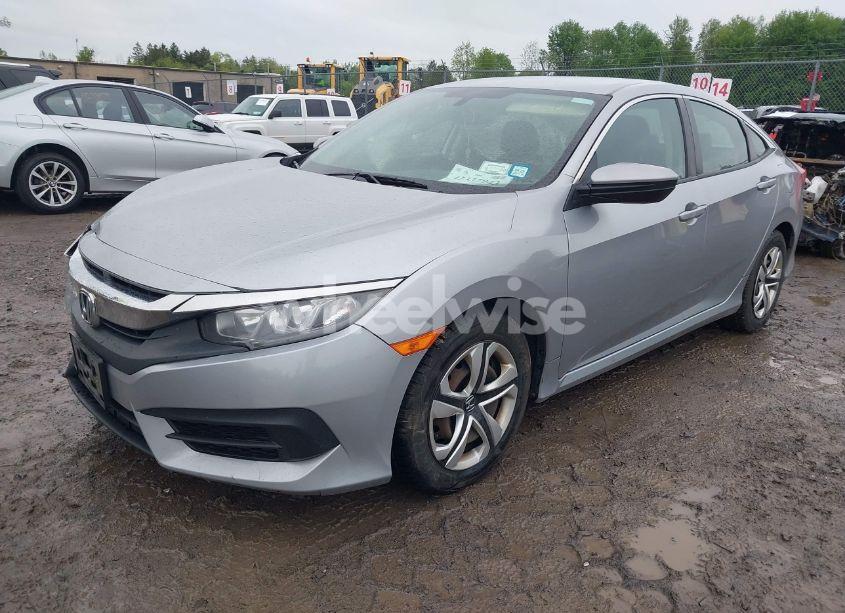 Photo 2 of 2017 Honda Civic LX (VIN 19XFC2F52HE229248)