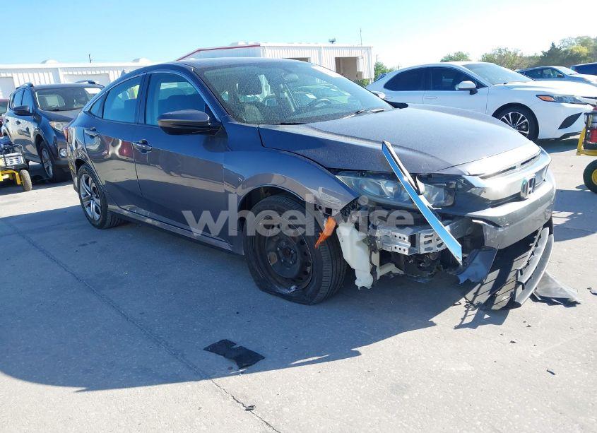 2018 Honda Civic LX (VIN 19XFC2F52JE000011) main photo