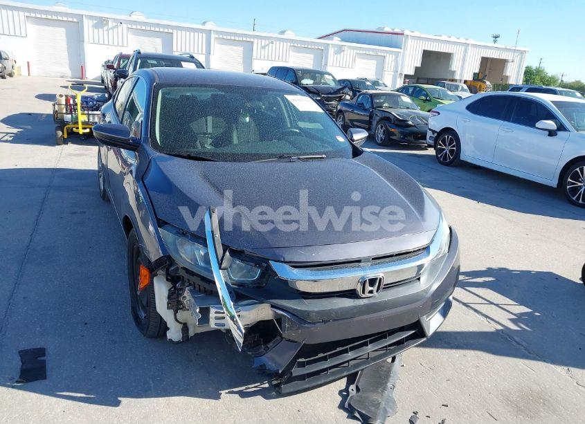 Photo 13 of 2018 Honda Civic LX (VIN 19XFC2F52JE000011)