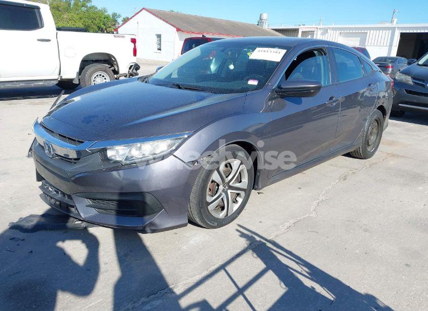 Photo 2 of 2018 Honda Civic LX (VIN 19XFC2F52JE000011)