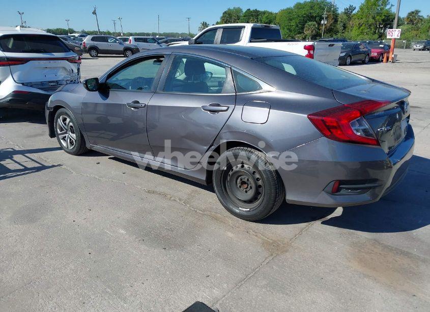 Photo 3 of 2018 Honda Civic LX (VIN 19XFC2F52JE000011)