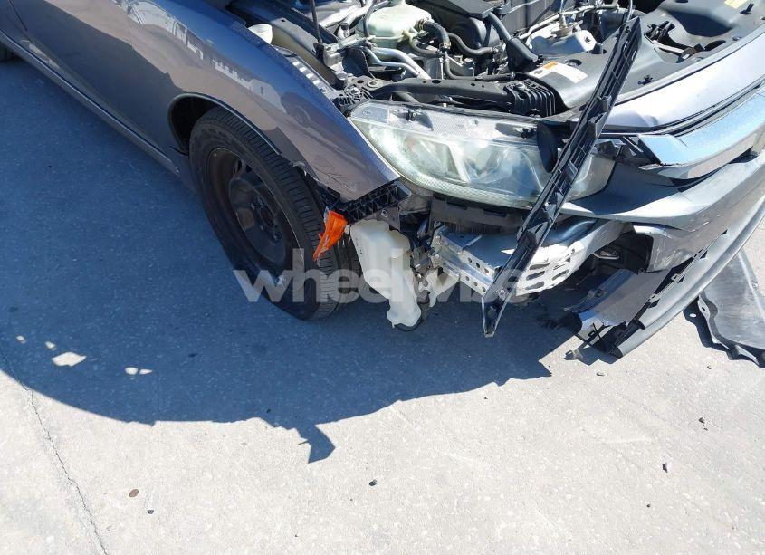 Photo 6 of 2018 Honda Civic LX (VIN 19XFC2F52JE000011)