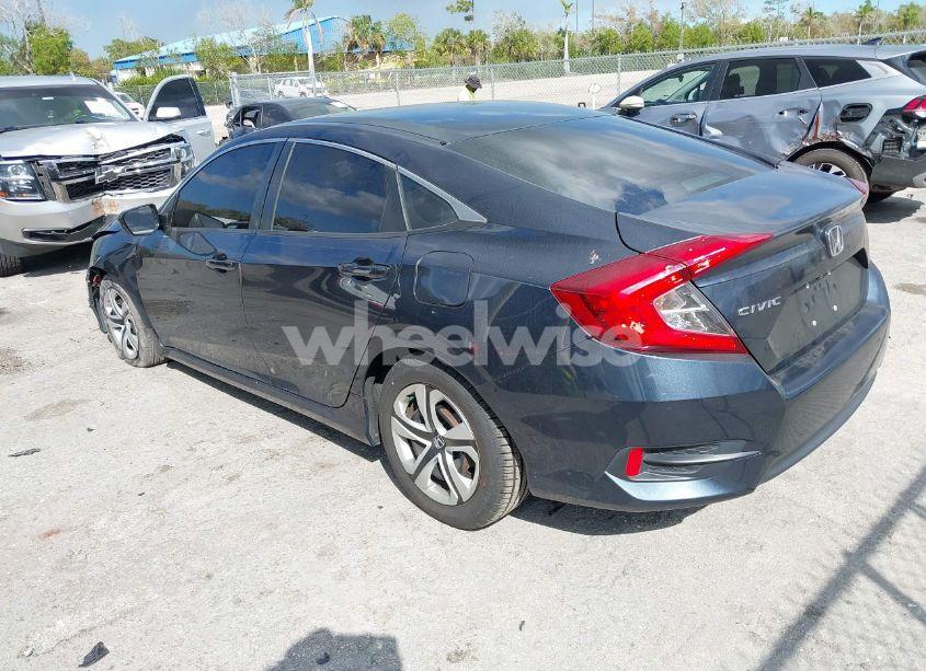 Photo 3 of 2018 Honda Civic LX (VIN 19XFC2F52JE014944)