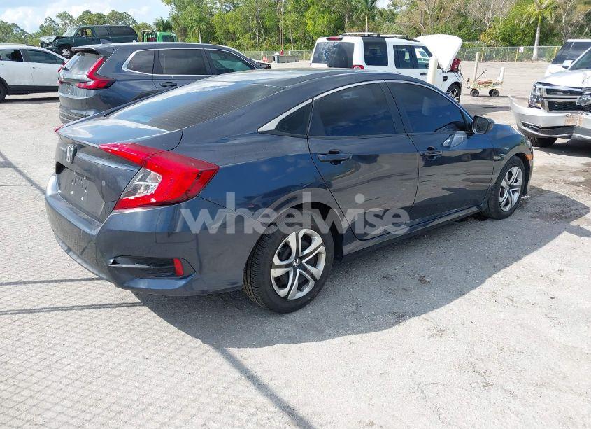 Photo 4 of 2018 Honda Civic LX (VIN 19XFC2F52JE014944)