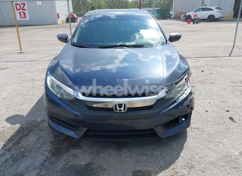 Photo 6 of 2018 Honda Civic LX (VIN 19XFC2F52JE014944)