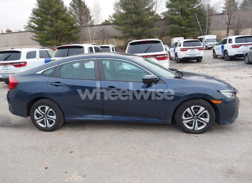 Photo 13 of 2018 Honda Civic LX (VIN 19XFC2F52JE016600)