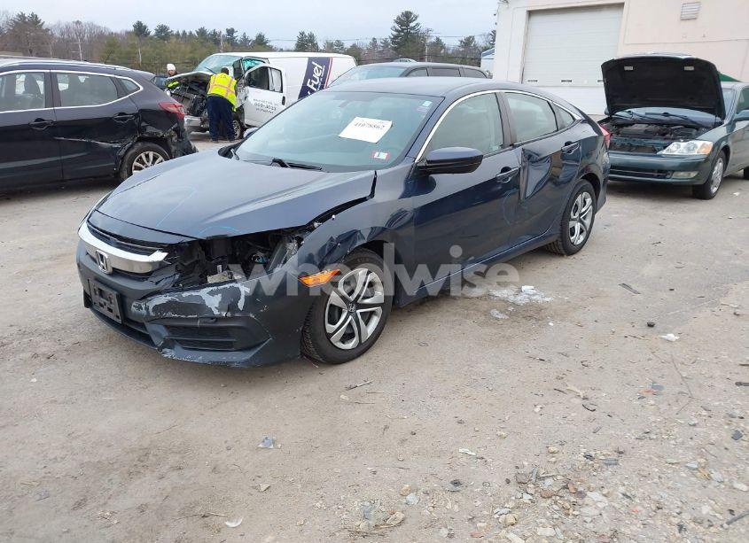 Photo 2 of 2018 Honda Civic LX (VIN 19XFC2F52JE016600)