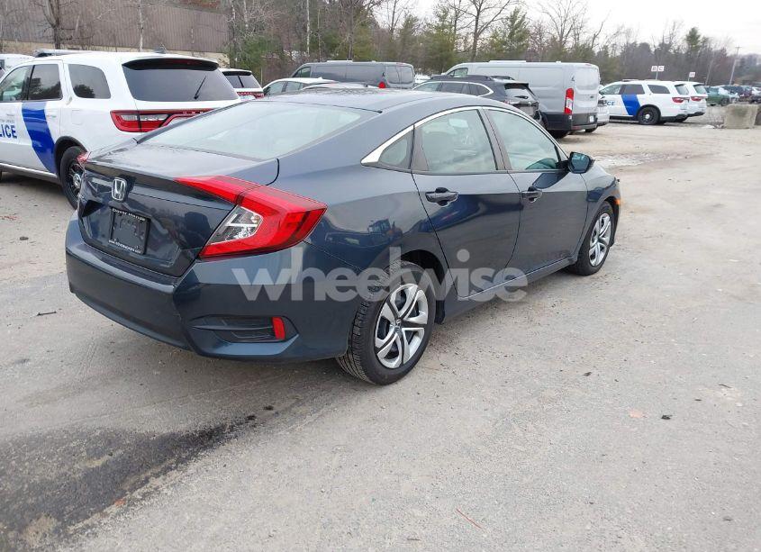 Photo 4 of 2018 Honda Civic LX (VIN 19XFC2F52JE016600)