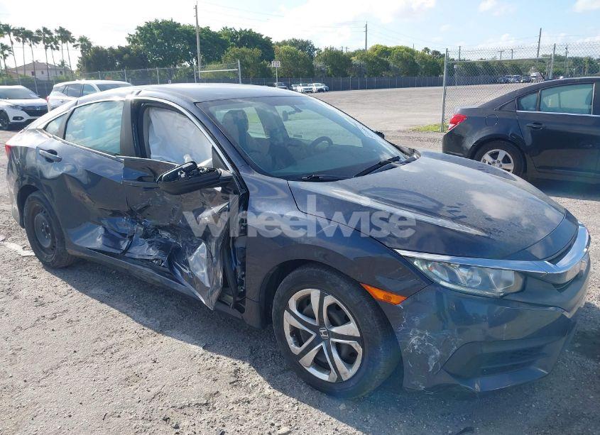2018 Honda Civic LX (VIN 19XFC2F52JE018654) main photo