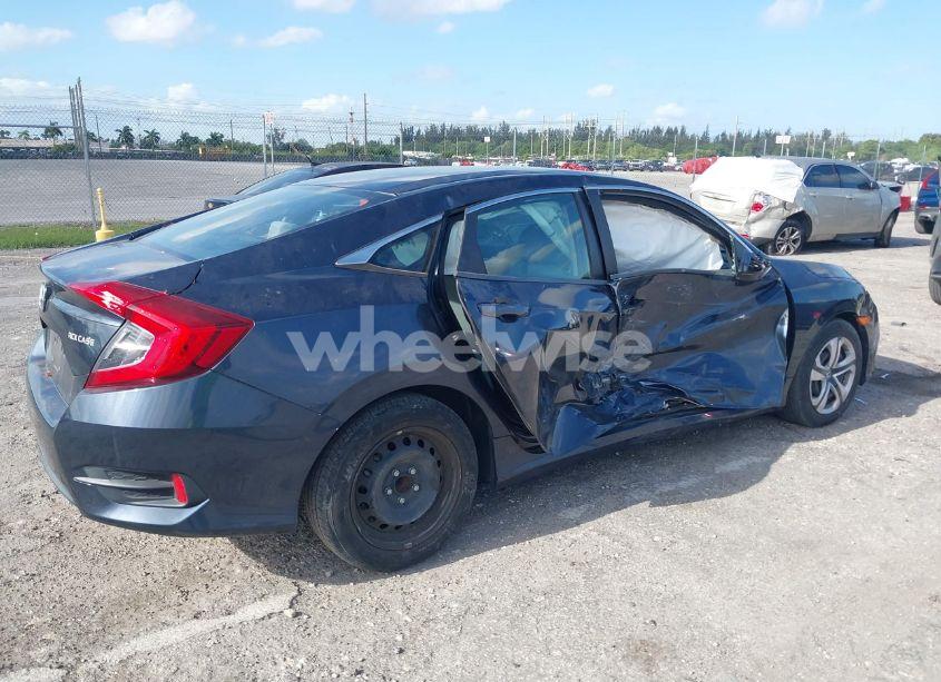 Photo 6 of 2018 Honda Civic LX (VIN 19XFC2F52JE018654)