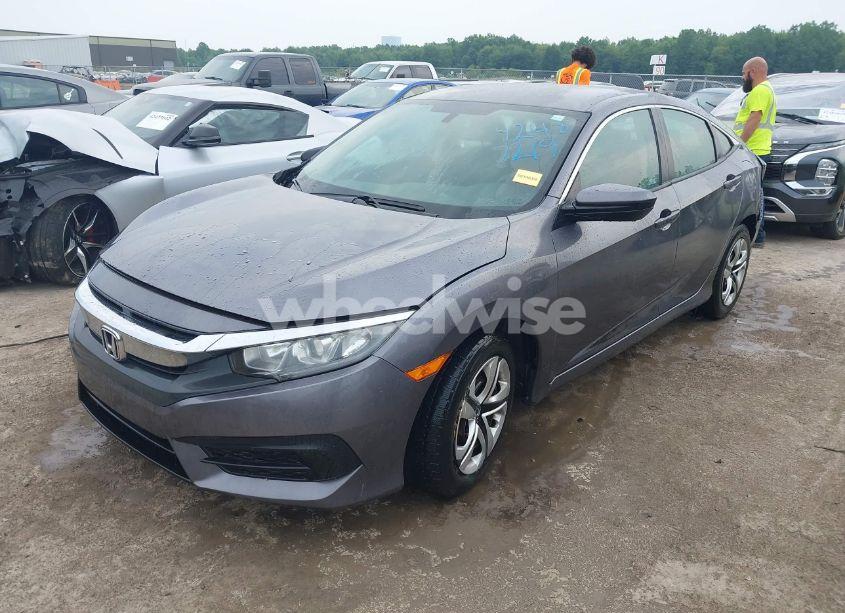 Photo 2 of 2018 Honda Civic LX (VIN 19XFC2F52JE020078)