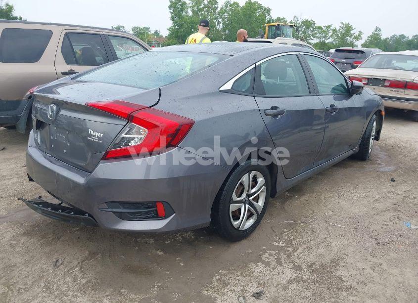 Photo 4 of 2018 Honda Civic LX (VIN 19XFC2F52JE020078)