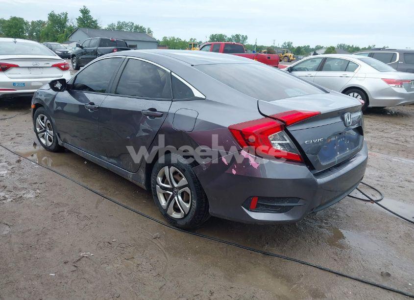 Photo 3 of 2018 Honda Civic LX (VIN 19XFC2F52JE022591)