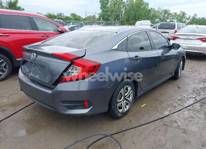 Photo 4 of 2018 Honda Civic LX (VIN 19XFC2F52JE022591)
