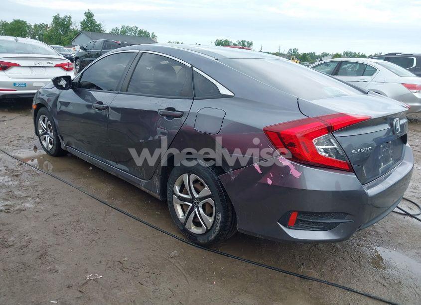 Photo 6 of 2018 Honda Civic LX (VIN 19XFC2F52JE022591)