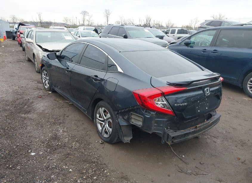 Photo 3 of 2018 Honda Civic LX (VIN 19XFC2F52JE023451)