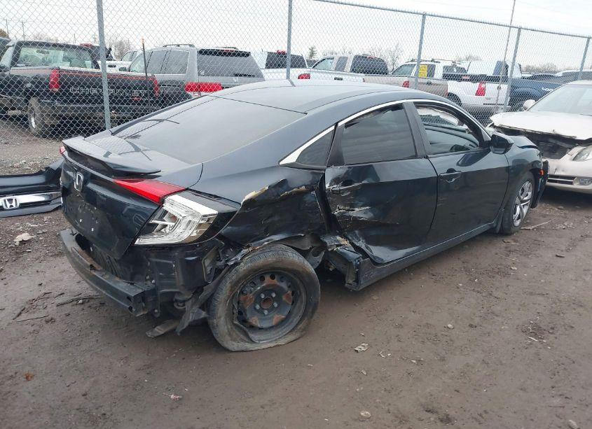 Photo 4 of 2018 Honda Civic LX (VIN 19XFC2F52JE023451)