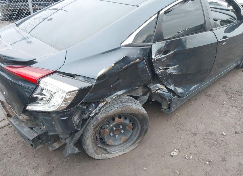 Photo 6 of 2018 Honda Civic LX (VIN 19XFC2F52JE023451)