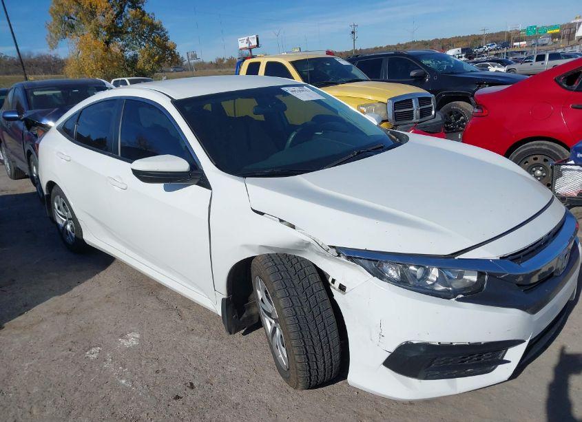 Photo 6 of 2018 Honda Civic LX (VIN 19XFC2F52JE041237)