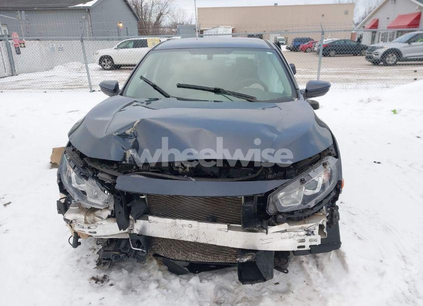 Photo 12 of 2018 Honda Civic LX (VIN 19XFC2F52JE042985)