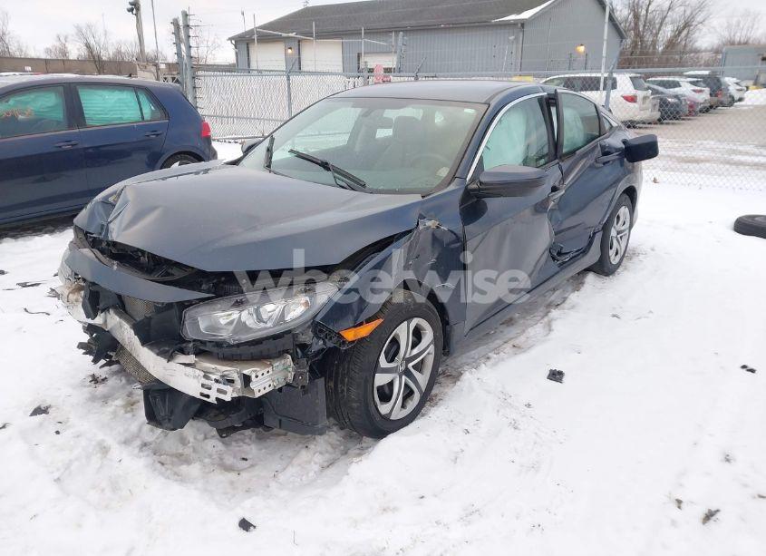 Photo 2 of 2018 Honda Civic LX (VIN 19XFC2F52JE042985)