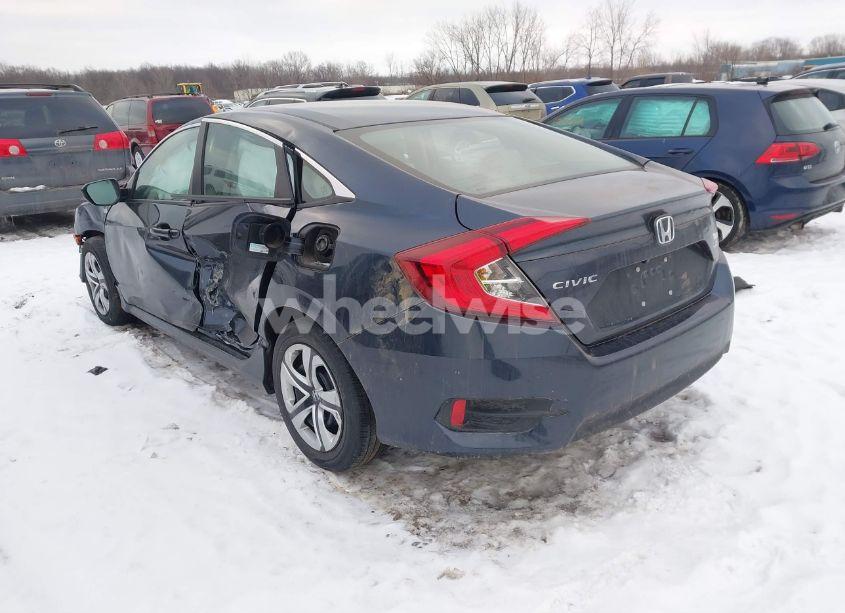 Photo 3 of 2018 Honda Civic LX (VIN 19XFC2F52JE042985)