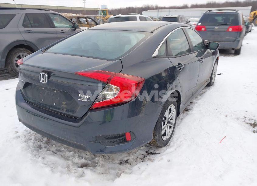 Photo 4 of 2018 Honda Civic LX (VIN 19XFC2F52JE042985)