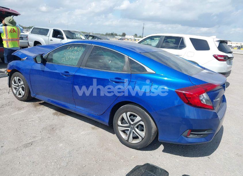 Photo 3 of 2018 Honda Civic LX (VIN 19XFC2F52JE043148)
